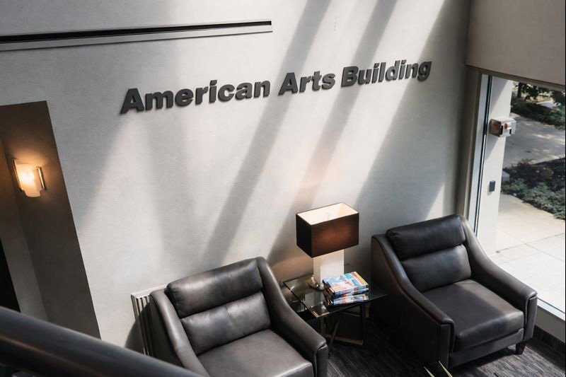 Interior dimensional logo sign installed as a brand moment in a lobby, by Frenchtown Signs