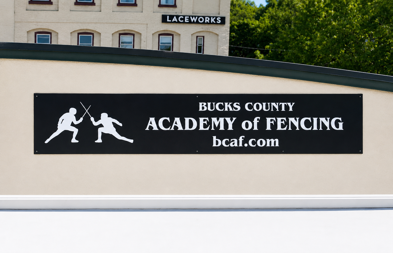 Custom academy exterior sign for Bucks County Academy of Fencing — designed and crafted by Frenchtown Signs in Frenchtown, NJ